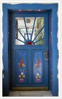 folk art painted blue door